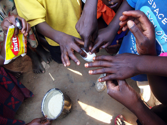 Kabermaido people touching finished soap